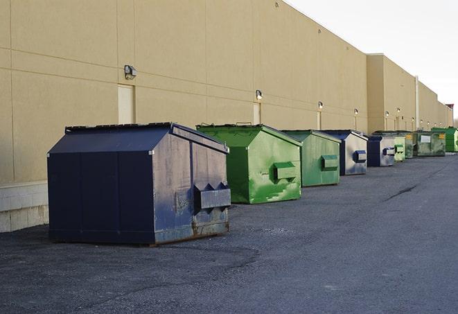 dumpsters arranged tidily on the construction site in Coahoma